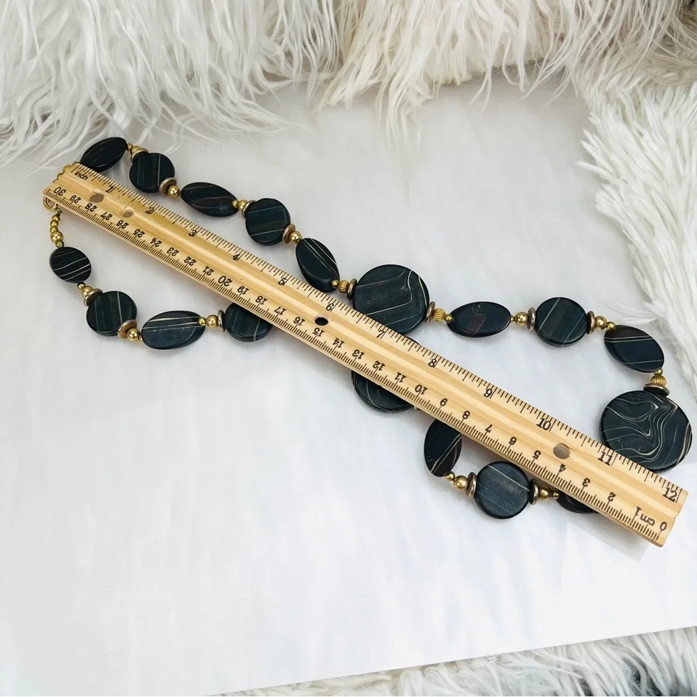 Pretty black swirl, and goldtone costume necklace